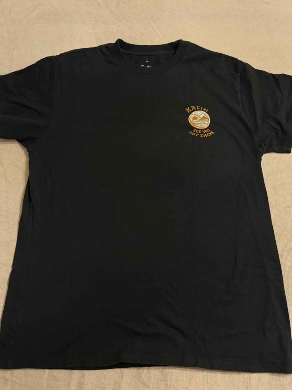 LG Black Short Sleeve Tee with Small Gold Chest Graphic
